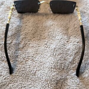 Fashion Nova Black and Gold Rimless Sunglasses